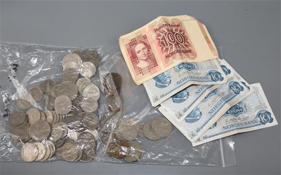 A collection of assorted notes and coinage